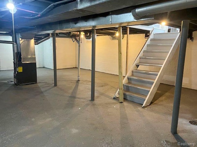 4651 Berkshire St, Detroit, MI 48224 - unfinished basement with stairs and heating unit