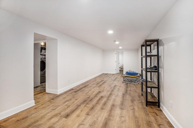 3341 Circle Dr, Saint Joseph, MI 49085 - finished below grade area with light wood finished floors, washer / dryer, and recessed lighting