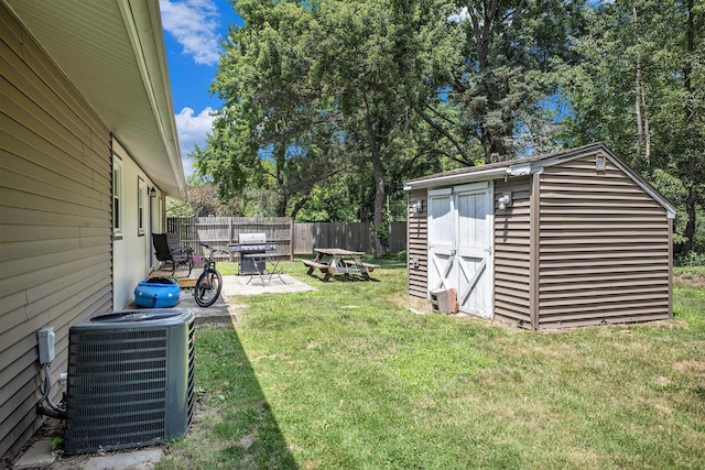 3341 Circle Dr, Saint Joseph, MI 49085 - view of yard featuring a patio and a storage unit