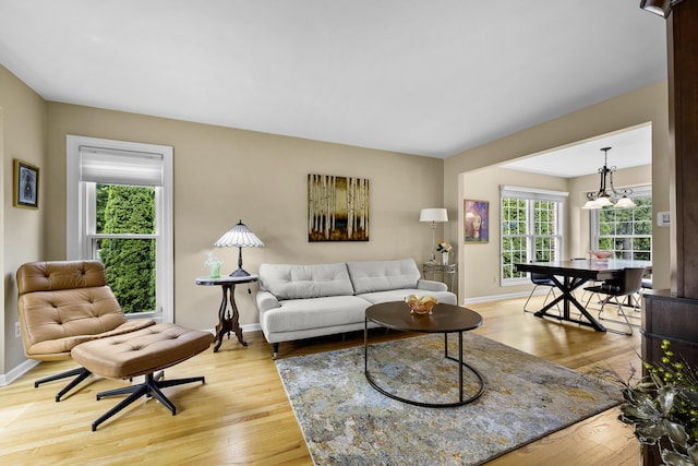 1015 Pointe Place Blvd, Rochester, MI 48307 - living room featuring wood finished floors