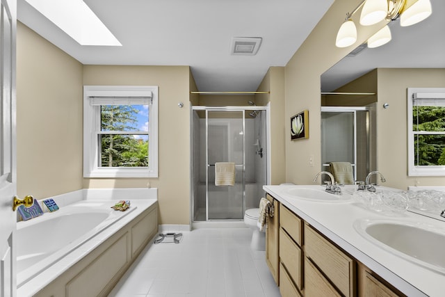 1015 Pointe Place Blvd, Rochester, MI 48307 - full bathroom with a skylight, a bath, a stall shower, double vanity, and tile patterned floors