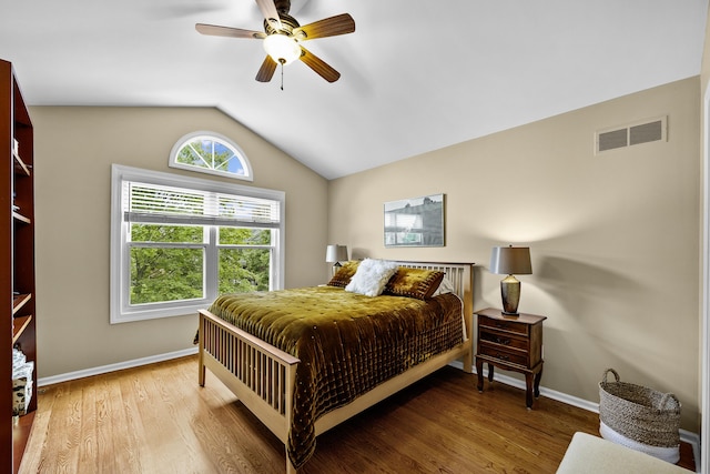 1015 Pointe Place Blvd, Rochester, MI 48307 - bedroom featuring vaulted ceiling, wood finished floors, and a ceiling fan