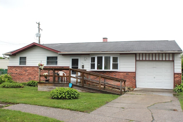 3211 S Arvin Dr, Saginaw, MI 48601 - view of front of property featuring brick siding, a garage, concrete driveway, and a chimney