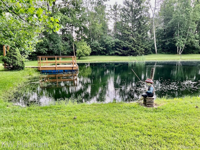 3775 Carrigan Rd, Fort Gratiot, MI 48059 - dock featuring a water view and a yard