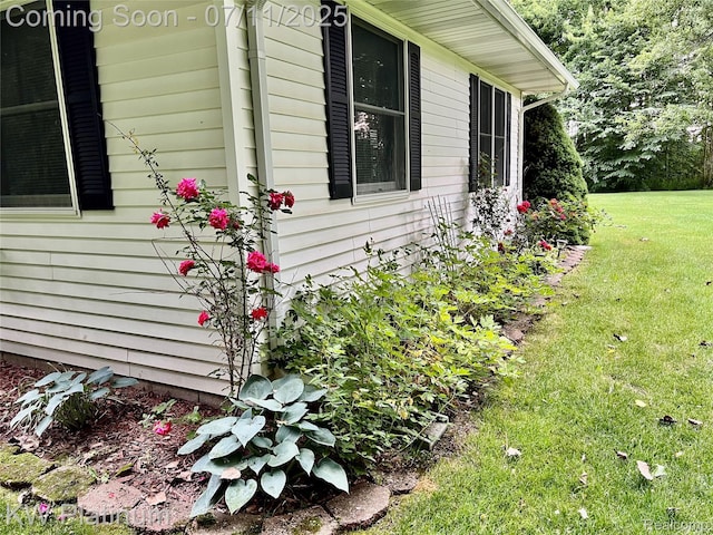 3775 Carrigan Rd, Fort Gratiot, MI 48059 - view of home's exterior with a yard