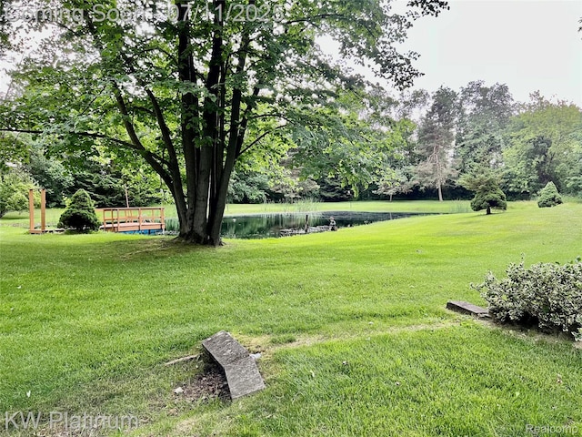 3775 Carrigan Rd, Fort Gratiot, MI 48059 - view of green lawn featuring a water view