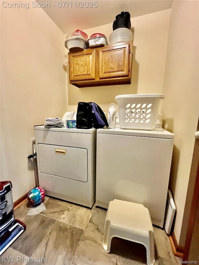 3775 Carrigan Rd, Fort Gratiot, MI 48059 - washroom featuring cabinet space and separate washer and dryer