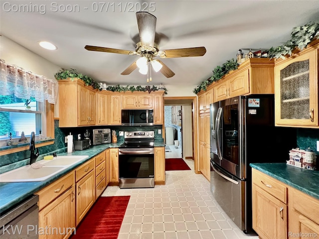 3775 Carrigan Rd, Fort Gratiot, MI 48059 - kitchen featuring stainless steel appliances, light brown cabinets, glass insert cabinets, and ceiling fan