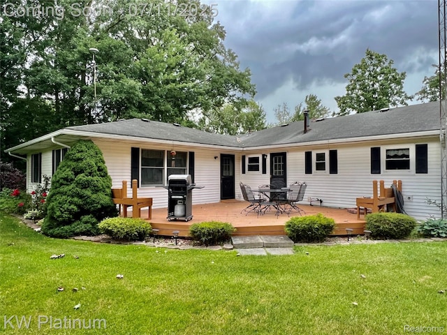 3775 Carrigan Rd, Fort Gratiot, MI 48059 - rear view of house featuring a yard and a wooden deck
