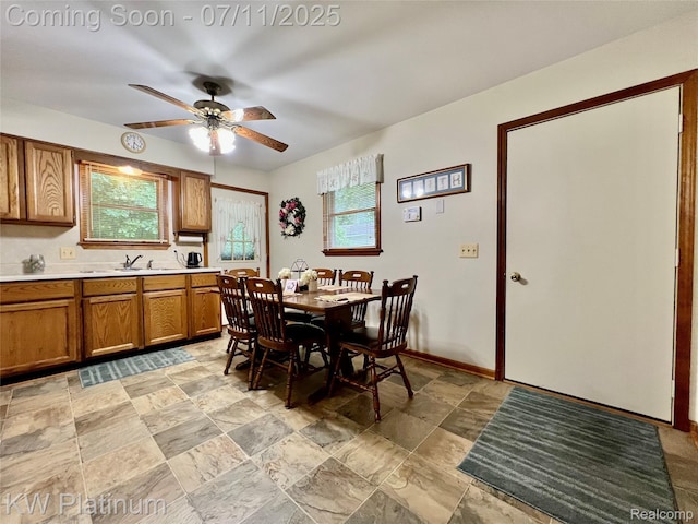 3775 Carrigan Rd, Fort Gratiot, MI 48059 - dining room featuring ceiling fan and light stone finish flooring