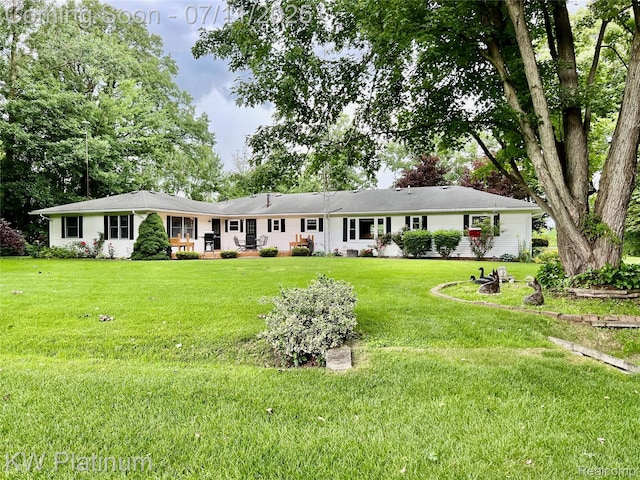 3775 Carrigan Rd, Fort Gratiot, MI 48059 - ranch-style home with a front lawn