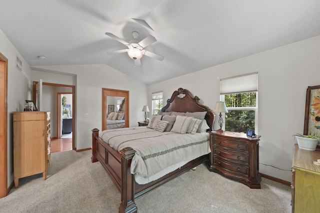 8395 Dalton Rd, Onsted, MI 49265 - bedroom with light carpet, vaulted ceiling, and ceiling fan