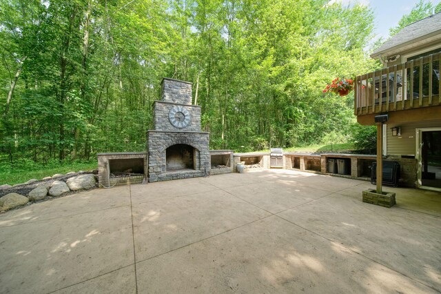 8395 Dalton Rd, Onsted, MI 49265 - view of patio with an outdoor stone fireplace