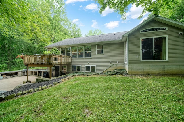 8395 Dalton Rd, Onsted, MI 49265 - rear view of house with a yard, a deck, and a patio
