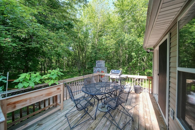 8395 Dalton Rd, Onsted, MI 49265 - wooden deck featuring outdoor dining area