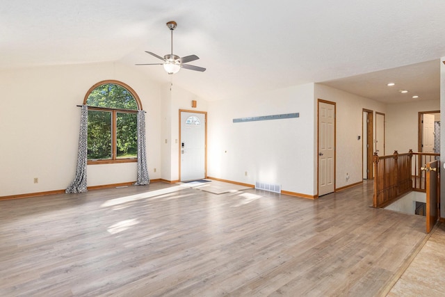 2240 Quincy Ave, Portage, MI 49024 - unfurnished living room featuring light wood-style flooring, lofted ceiling, a ceiling fan, and recessed lighting