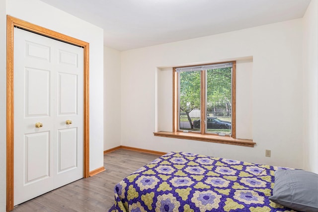 2240 Quincy Ave, Portage, MI 49024 - bedroom with wood finished floors and baseboards