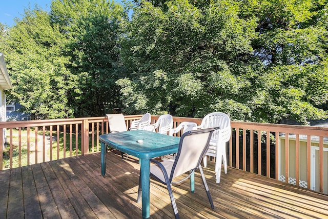 2240 Quincy Ave, Portage, MI 49024 - wooden deck featuring outdoor dining area