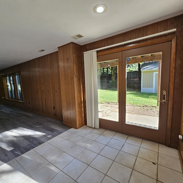 2240 Quincy Ave, Portage, MI 49024 - doorway to outside featuring wood walls