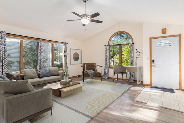 2240 Quincy Ave, Portage, MI 49024 - living room with lofted ceiling, plenty of natural light, ceiling fan, and wood finished floors