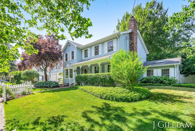 1214 Euna Vista Dr, Holland, MI 49423 - traditional home featuring a chimney