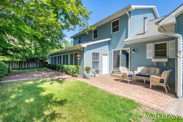 1214 Euna Vista Dr, Holland, MI 49423 - rear view of property with a patio area and roof with shingles