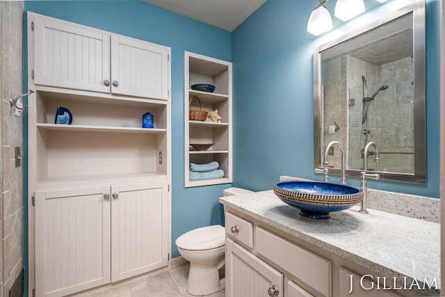 1214 Euna Vista Dr, Holland, MI 49423 - bathroom featuring vanity, tile patterned flooring, and tiled shower