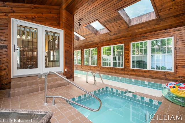 1214 Euna Vista Dr, Holland, MI 49423 - indoor pool with a skylight and an in-ground hot tub