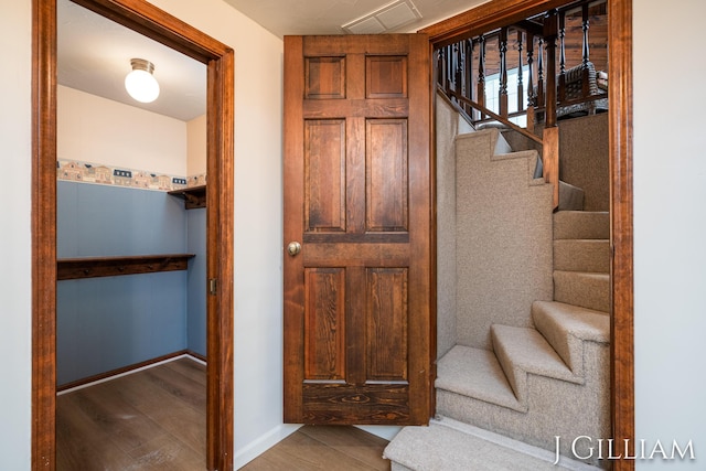 1214 Euna Vista Dr, Holland, MI 49423 - stairway featuring baseboards and wood finished floors