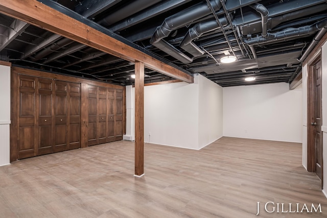 1214 Euna Vista Dr, Holland, MI 49423 - finished below grade area featuring wood finished floors