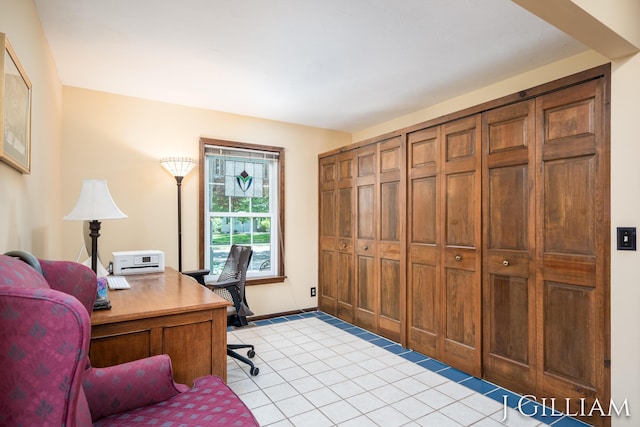 1214 Euna Vista Dr, Holland, MI 49423 - office area with light tile patterned floors and baseboards
