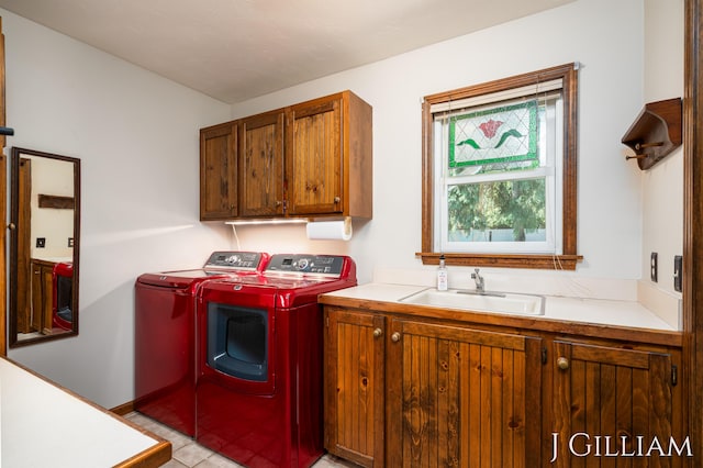 1214 Euna Vista Dr, Holland, MI 49423 - laundry room featuring cabinet space, independent washer and dryer, and light tile patterned flooring