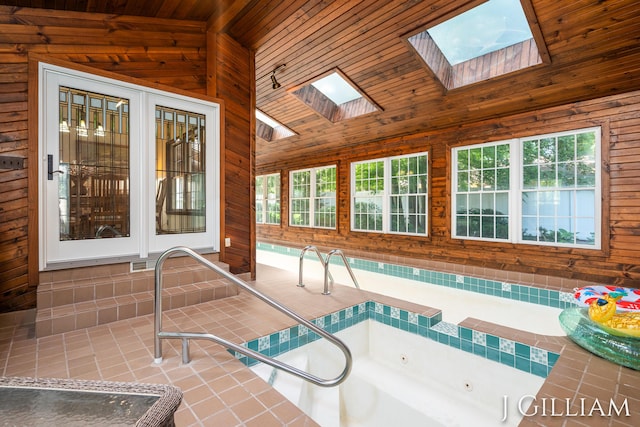 1214 Euna Vista Dr, Holland, MI 49423 - view of swimming pool featuring a skylight