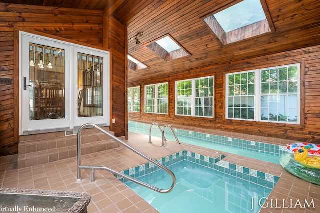 1214 Euna Vista Dr, Holland, MI 49423 - indoor pool with a skylight and a hot tub