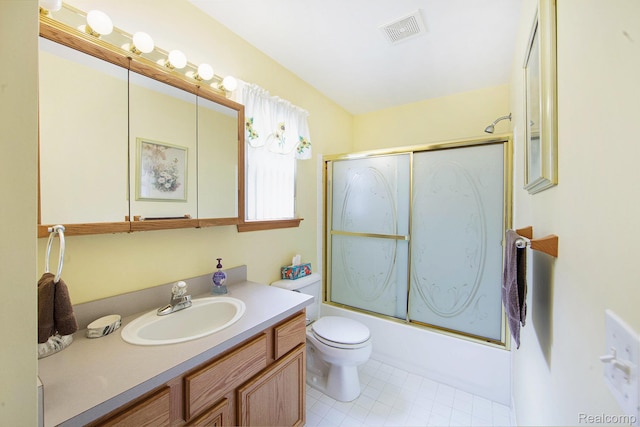 32851 Foster Ct, Fraser, MI 48026 - full bath with vanity, shower / bath combination with glass door, and tile patterned floors