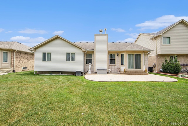 32851 Foster Ct, Fraser, MI 48026 - rear view of property with a patio area, a yard, a chimney, and entry steps