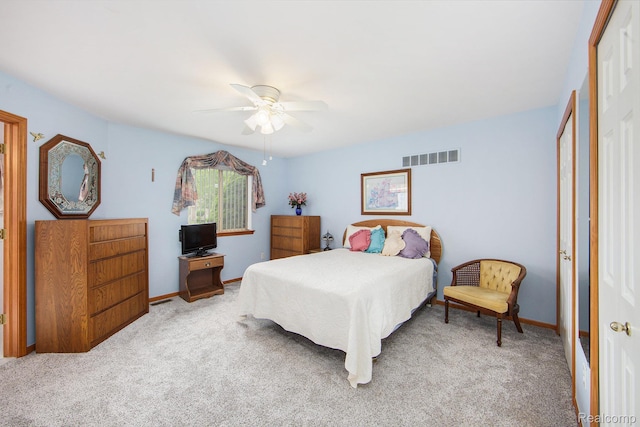 32851 Foster Ct, Fraser, MI 48026 - bedroom featuring light colored carpet, a closet, and a ceiling fan