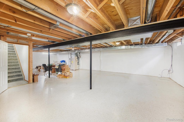 32851 Foster Ct, Fraser, MI 48026 - unfinished below grade area with water heater and stairway