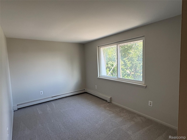 152 Ladd Rd Unit 1, Walled Lake, MI 48390 - carpeted spare room featuring a baseboard heating unit and baseboards