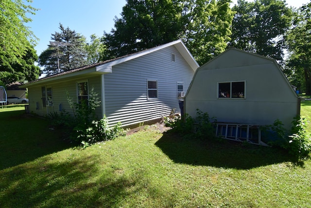325 Dallas St, Colon, MI 49040 - view of side of property featuring a trampoline and a yard