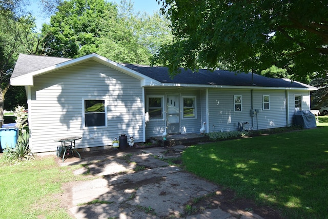 325 Dallas St, Colon, MI 49040 - view of front of property featuring a front lawn and a shingled roof