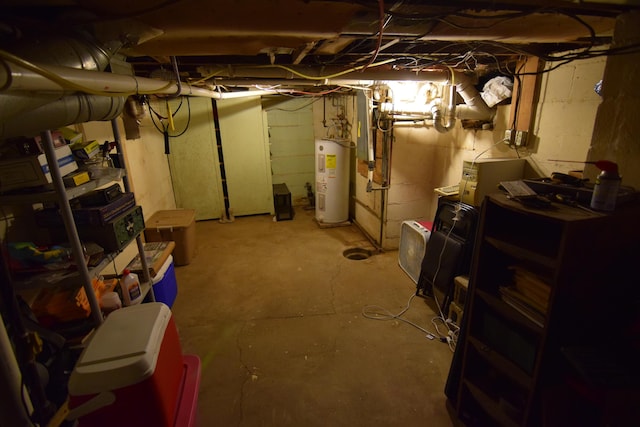 325 Dallas St, Colon, MI 49040 - unfinished basement featuring water heater