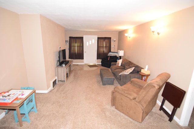 325 Dallas St, Colon, MI 49040 - carpeted living area featuring baseboards
