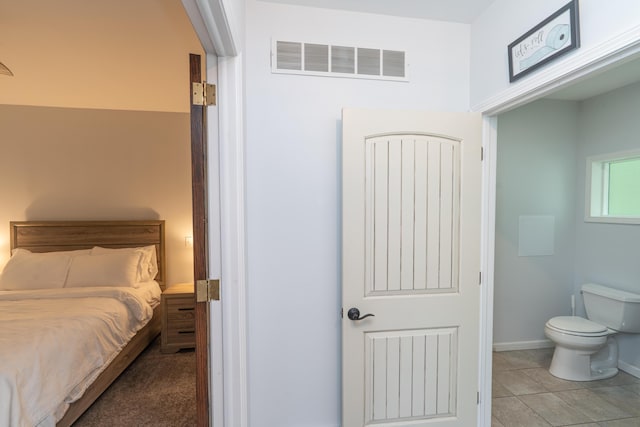 11901 187th Ave, Stanwood, MI 49346 - tiled bedroom featuring baseboards
