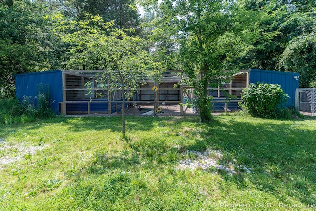 9265 Mulliken Rd, Mulliken, MI 48861 - view of yard featuring an outbuilding