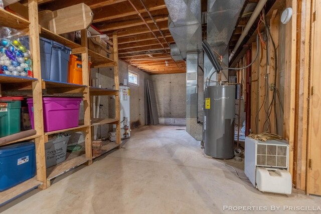 9265 Mulliken Rd, Mulliken, MI 48861 - basement with water heater