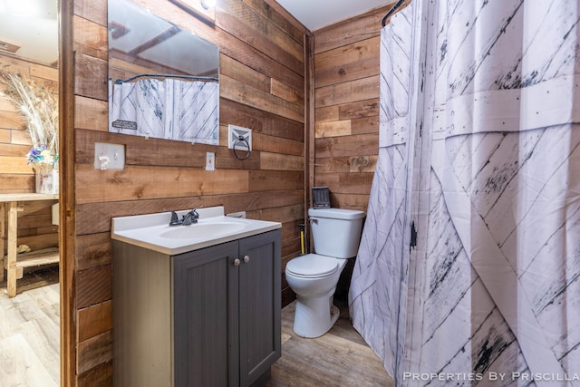 9265 Mulliken Rd, Mulliken, MI 48861 - full bathroom with wood walls, wood finished floors, and vanity