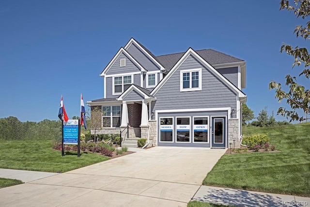 2348 Provencal Dr, Bloomfield Hills, MI 48382 - view of front facade with stone siding, driveway, and a front yard