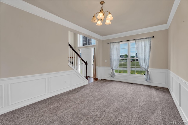 6119 Amber Ln, Grand Blanc, MI 48439 - carpeted spare room with a chandelier, ornamental molding, stairway, a wainscoted wall, and a decorative wall
