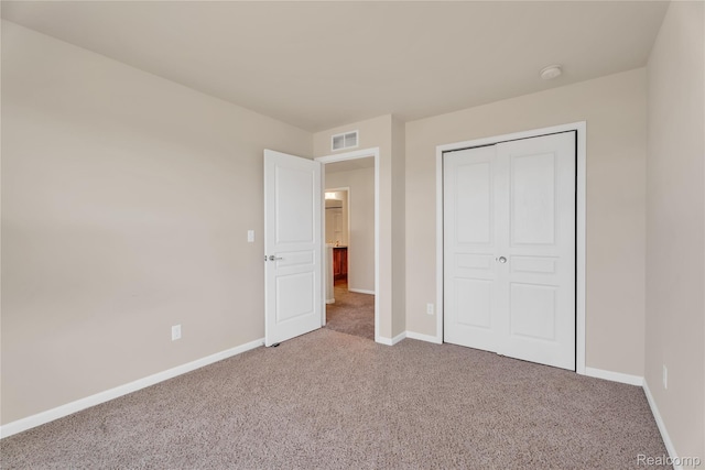 6119 Amber Ln, Grand Blanc, MI 48439 - unfurnished bedroom featuring carpet and a closet